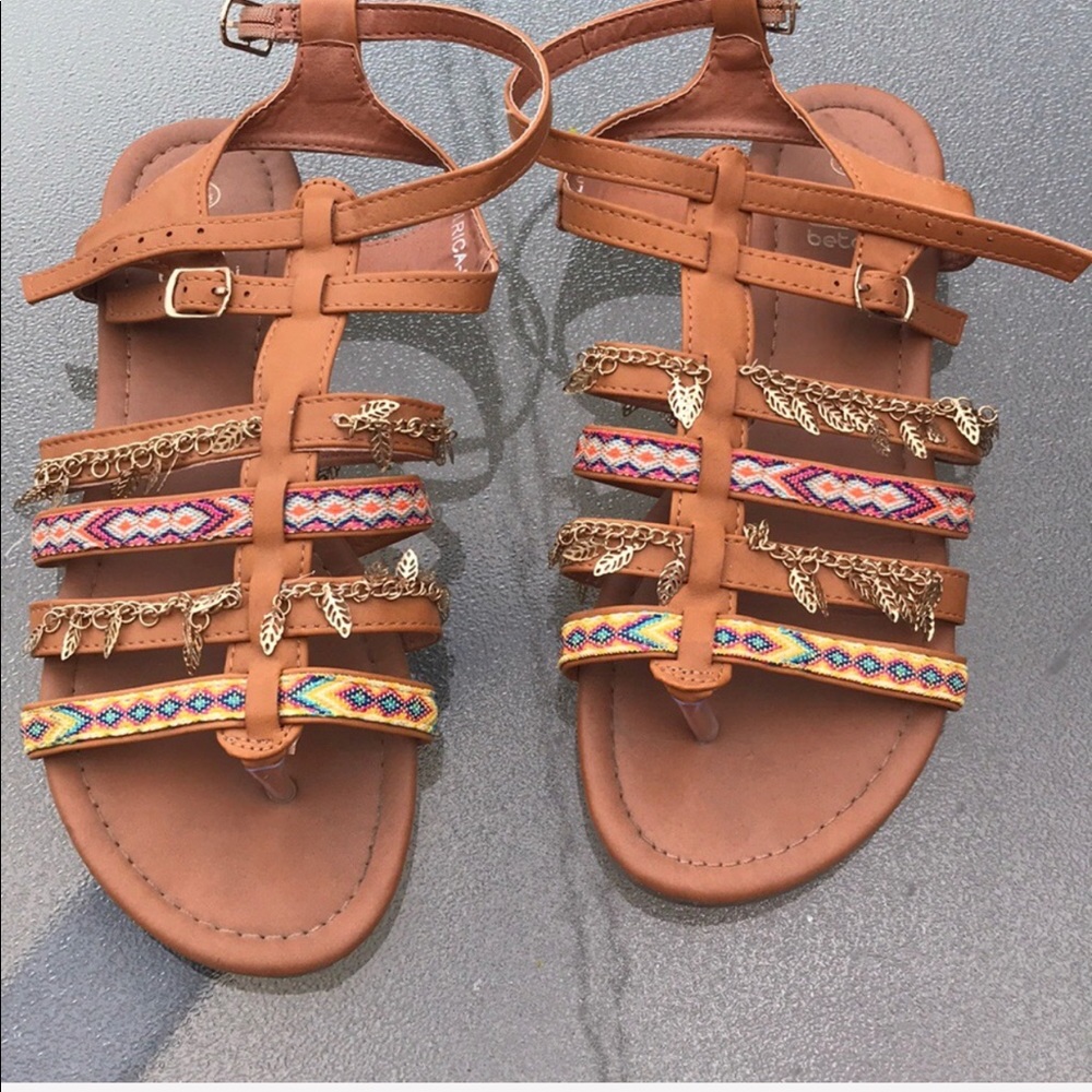 Three pairs of fashion sandals.